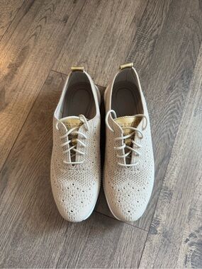 Cole Haan Beige Knit Wingtip Casual Sneakers with Gold Accent